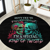 Black round skull graphic area rug with teal and red skulls and “Don’t try to figure me out”