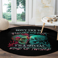 Black round skull graphic rug with teal and red skulls and pink “Don’t try to figure me out” text