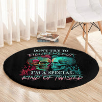 Black round skull graphic rug with teal and red skulls and “I’m a special kind of twisted”