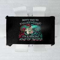 Black tablecloth with multicolor skull and rebellious quote text in center