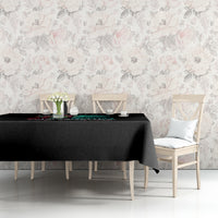 Black tablecloth with partial multicolor skull graphic on dining bench
