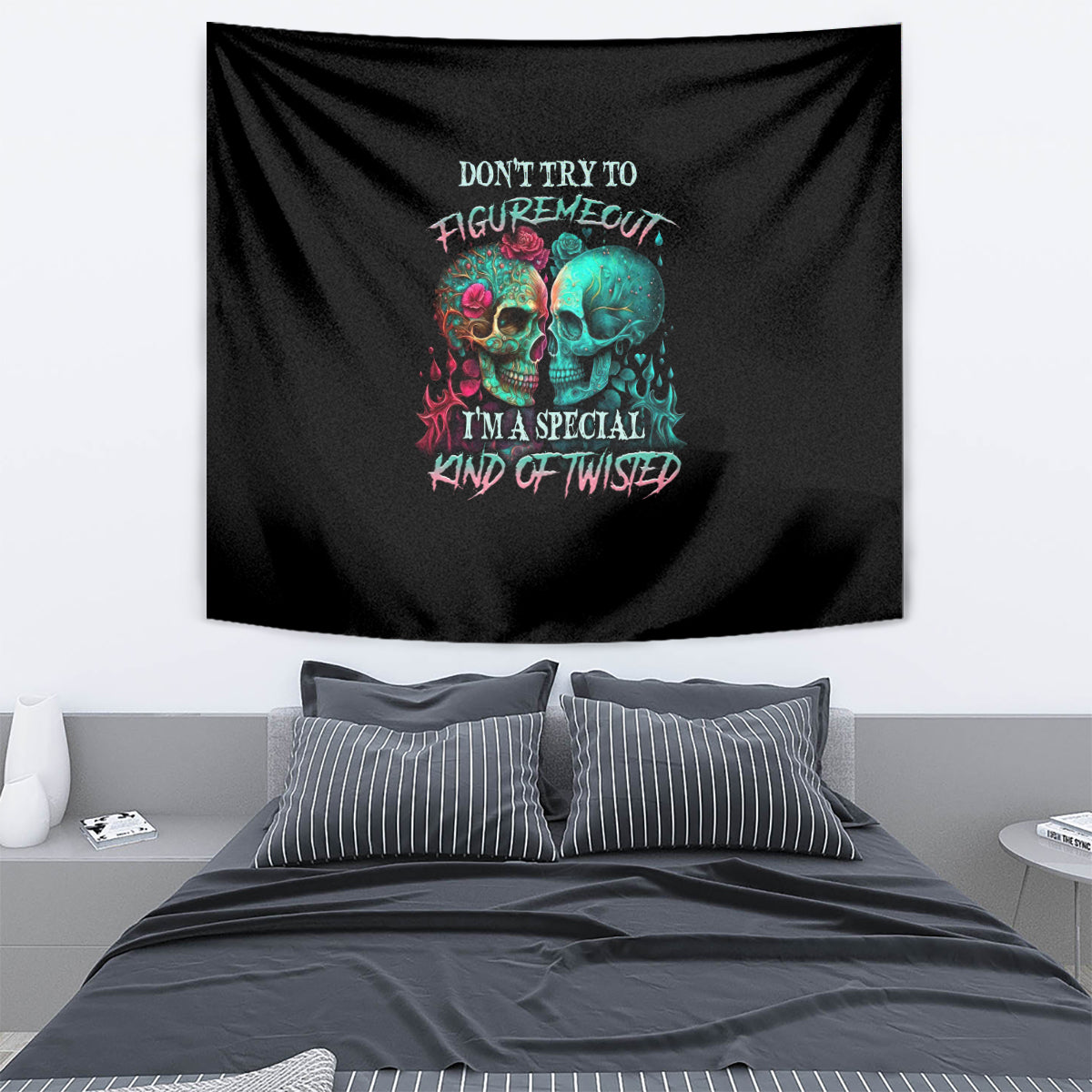 Black skull tapestry with multicolor text graphic, rectangular wall hanging.