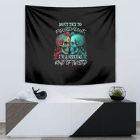Black skull tapestry featuring multicolor text and two colorful skull faces.
