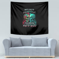 Black skull tapestry with multicolor text and two skulls printed center.