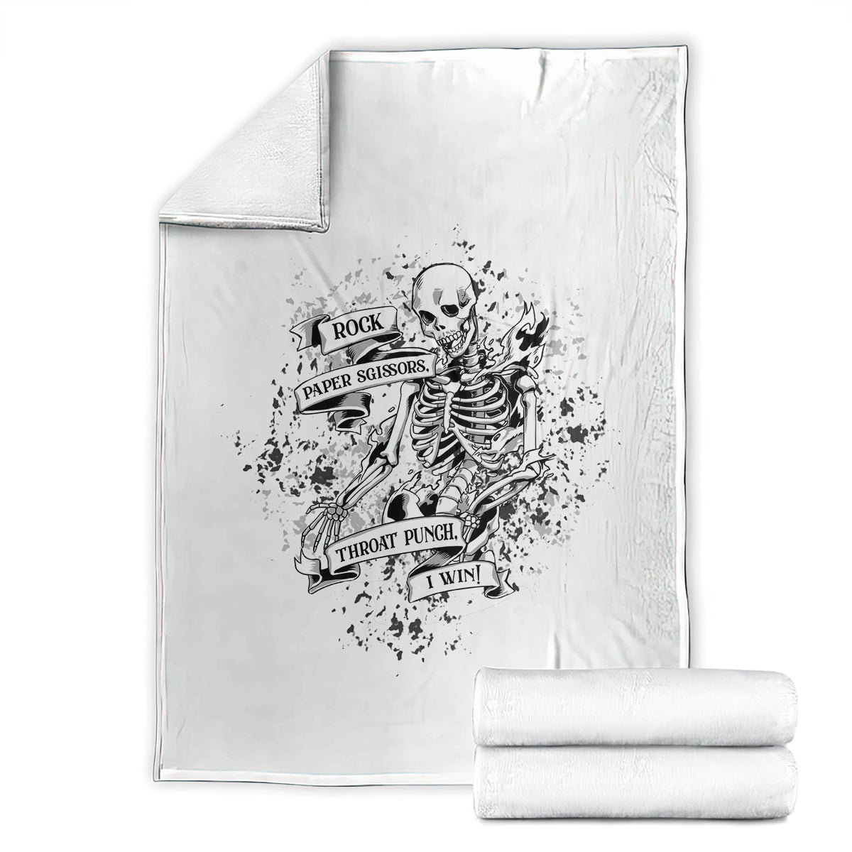 White throw blanket with black skeleton emblem; shown with two folded matching blankets
