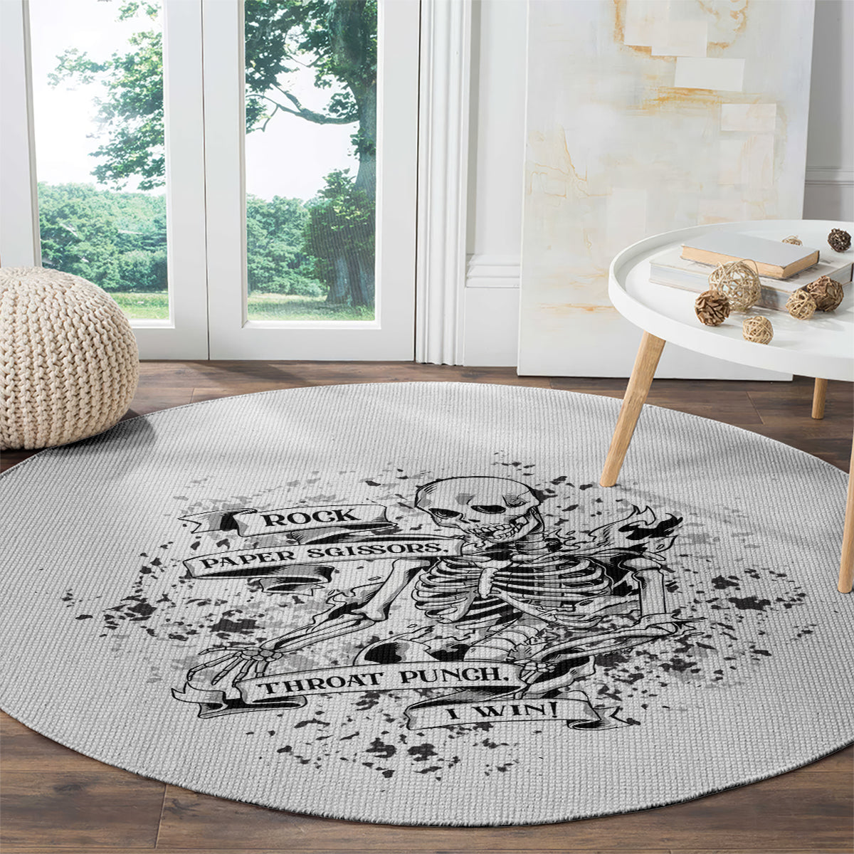 Round game rug with light gray base and black skeleton Rock Paper Scissors design