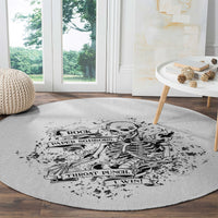 Round game rug with light gray base and black skeleton Rock Paper Scissors design