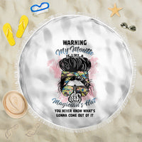 Round white beach blanket with multicolor warning text and magician graphic, tassel fringe