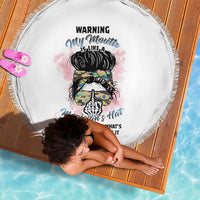 Round white beach blanket with multicolor warning magician graphic and tassel fringe edge