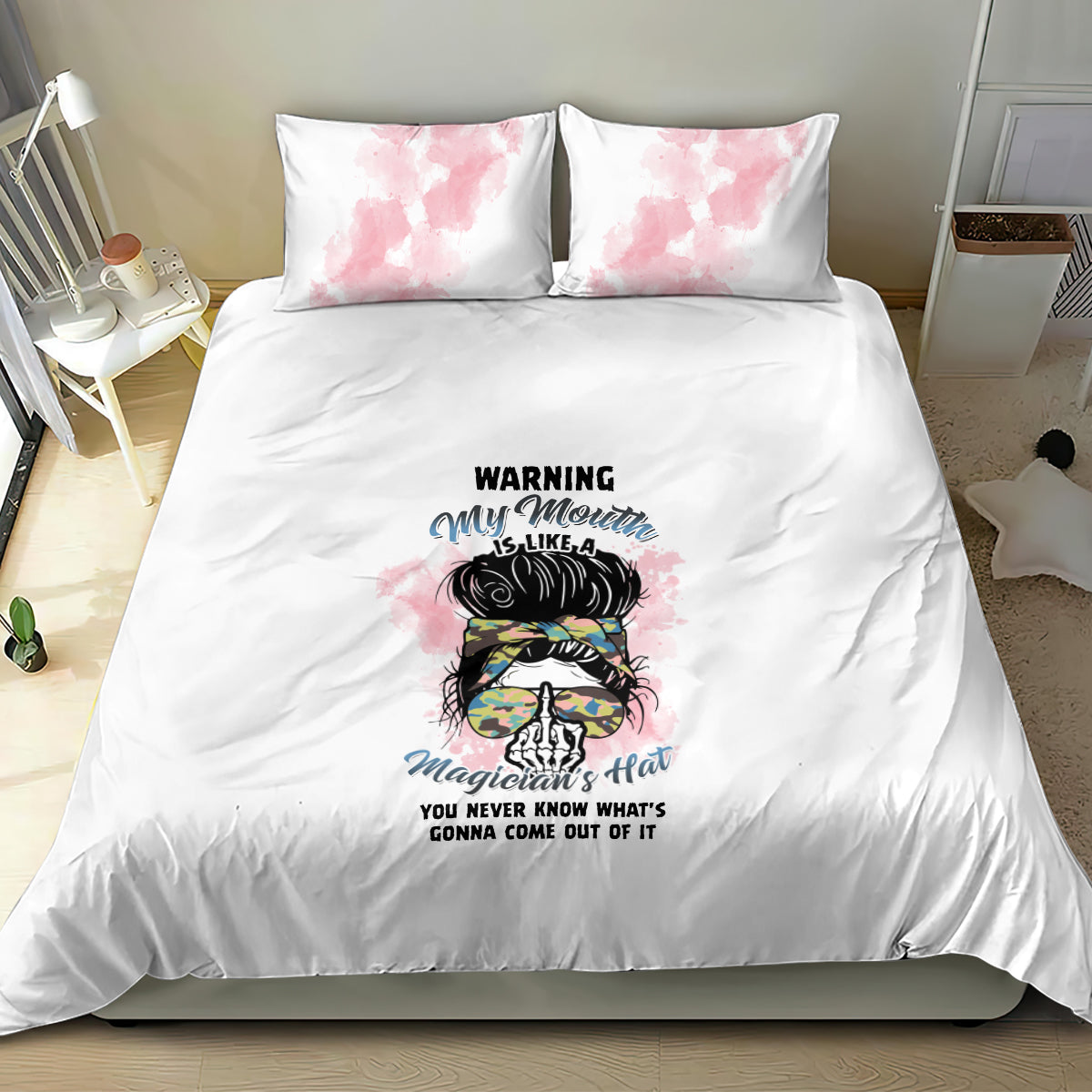 White duvet bedding set with pink watercolor pillow shams and colorful illustrated warning design
