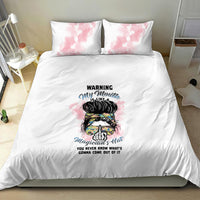 White duvet bedding set with pink watercolor pillow shams and colorful illustrated warning design