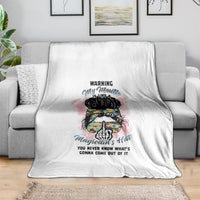White blanket with colorful illustrated hair bun and warning quote design