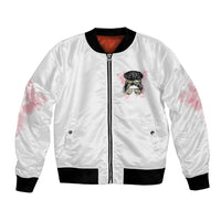 White bomber jacket with front zipper, colorful face graphic, black ribbed hem and cuffs