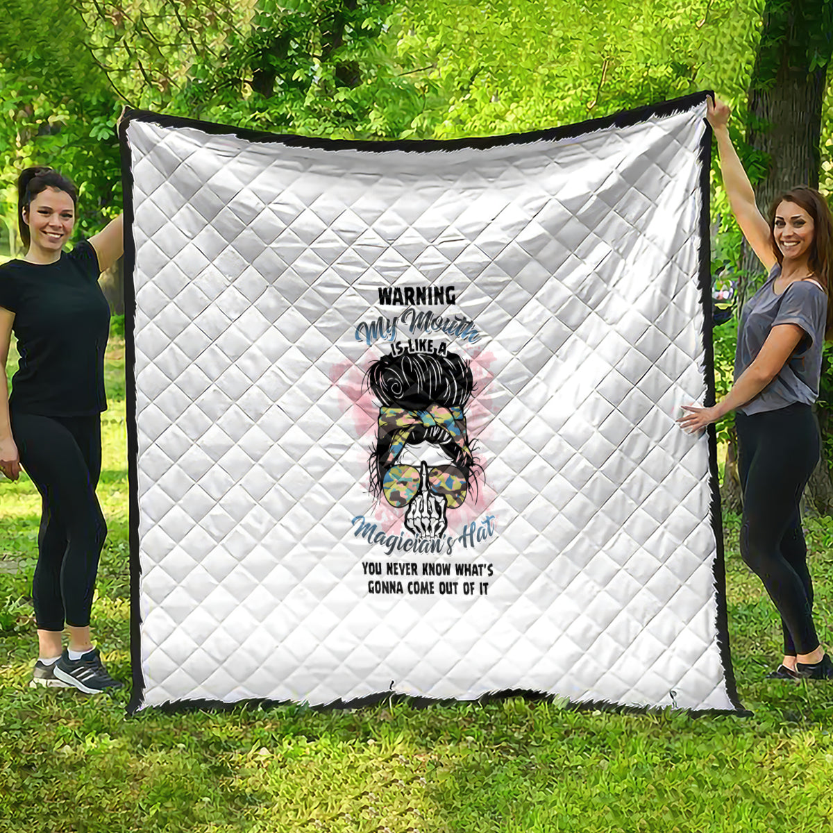 White quilt with diamond stitching and colorful "Warning My Mouth" girl graphic