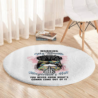 Round gray carpet rug with colorful hat and skull print and warning text