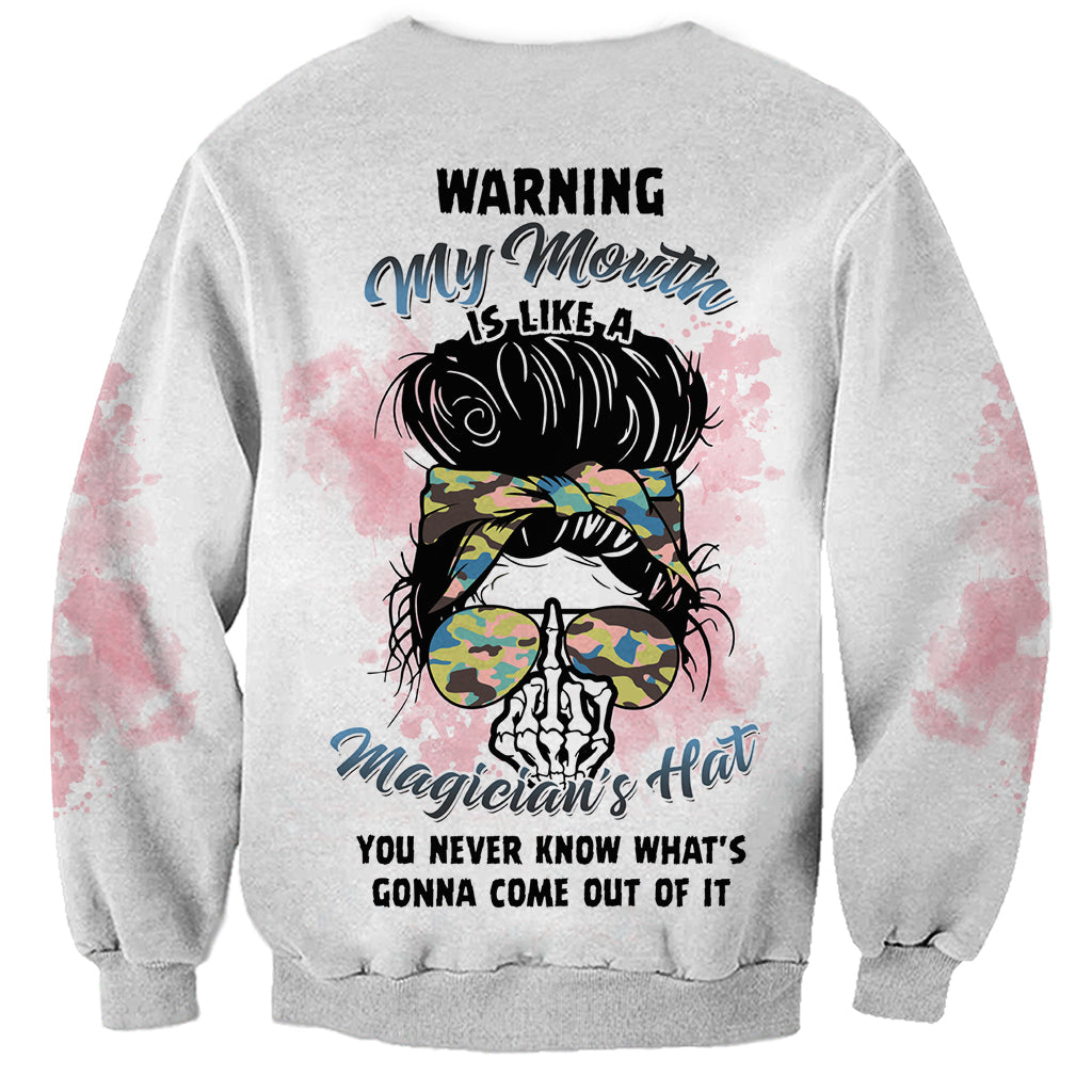 Gray crewneck sweatshirt with back 'WARNING' and magician messy bun hat graphic