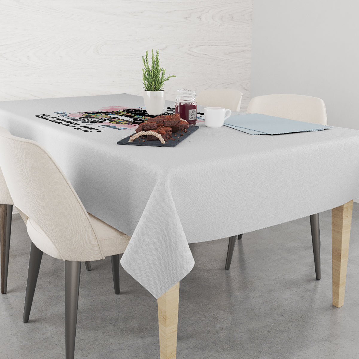 Gray tablecloth on dining table with centered warning graphic panel