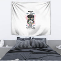 White wall tapestry with multicolor 'Warning' text and stylized cartoon face graphic