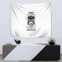 White wall tapestry featuring multicolor character face artwork and 'Warning' wording