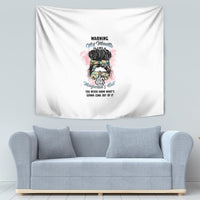 White wall tapestry with multicolor 'Warning' text above stylized hair and glasses artwork