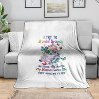 White throw blanket with colorful sugar skull and butterfly graphic and quote text