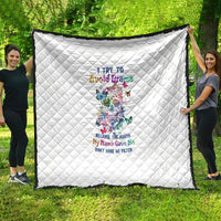 White quilt with diamond stitching and colorful sugar skull graphic, centered design
