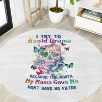 Round white rug with large colorful sugar skull, butterflies, and bold quote lettering