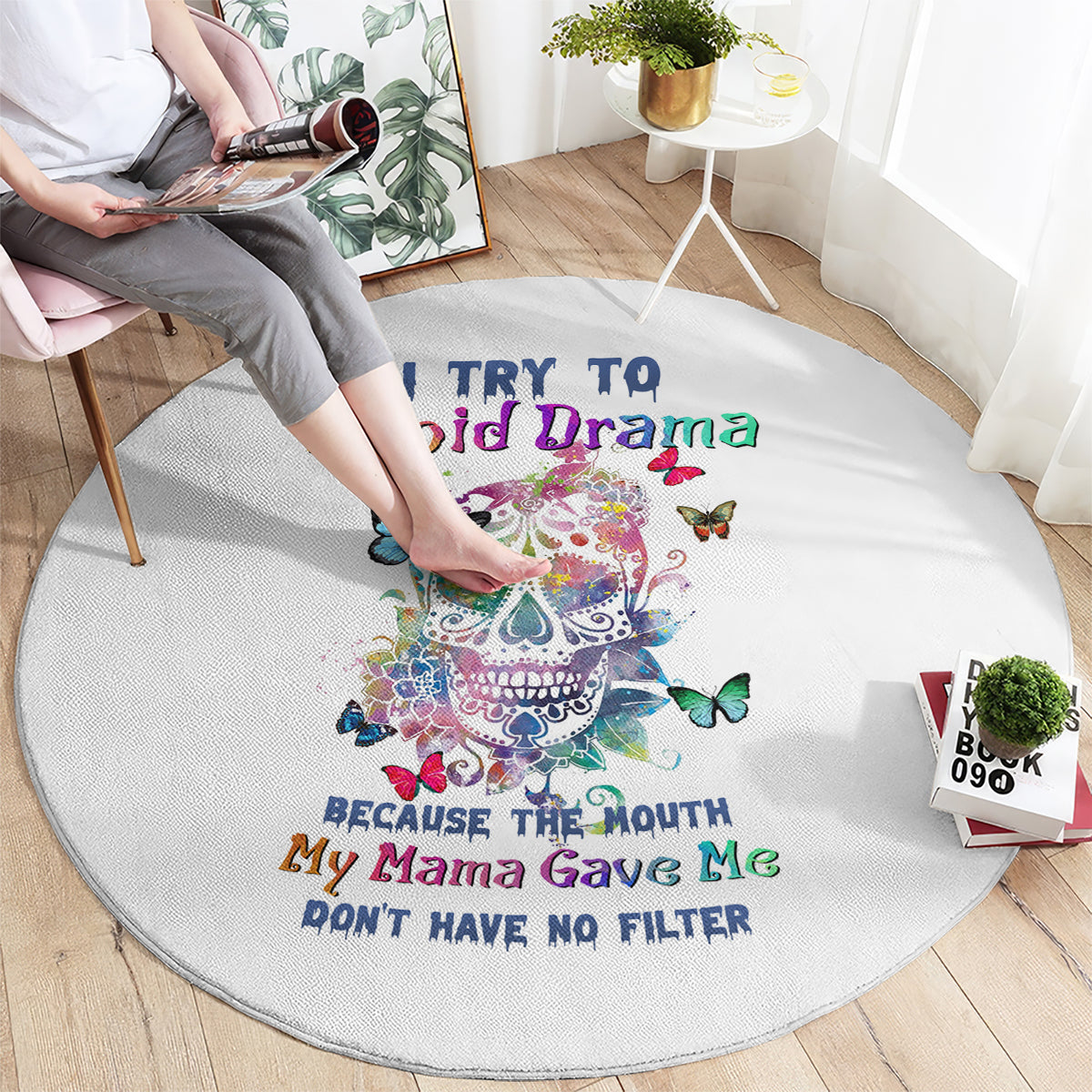 Round white carpet rug with colorful sugar skull, butterflies, and quote text design