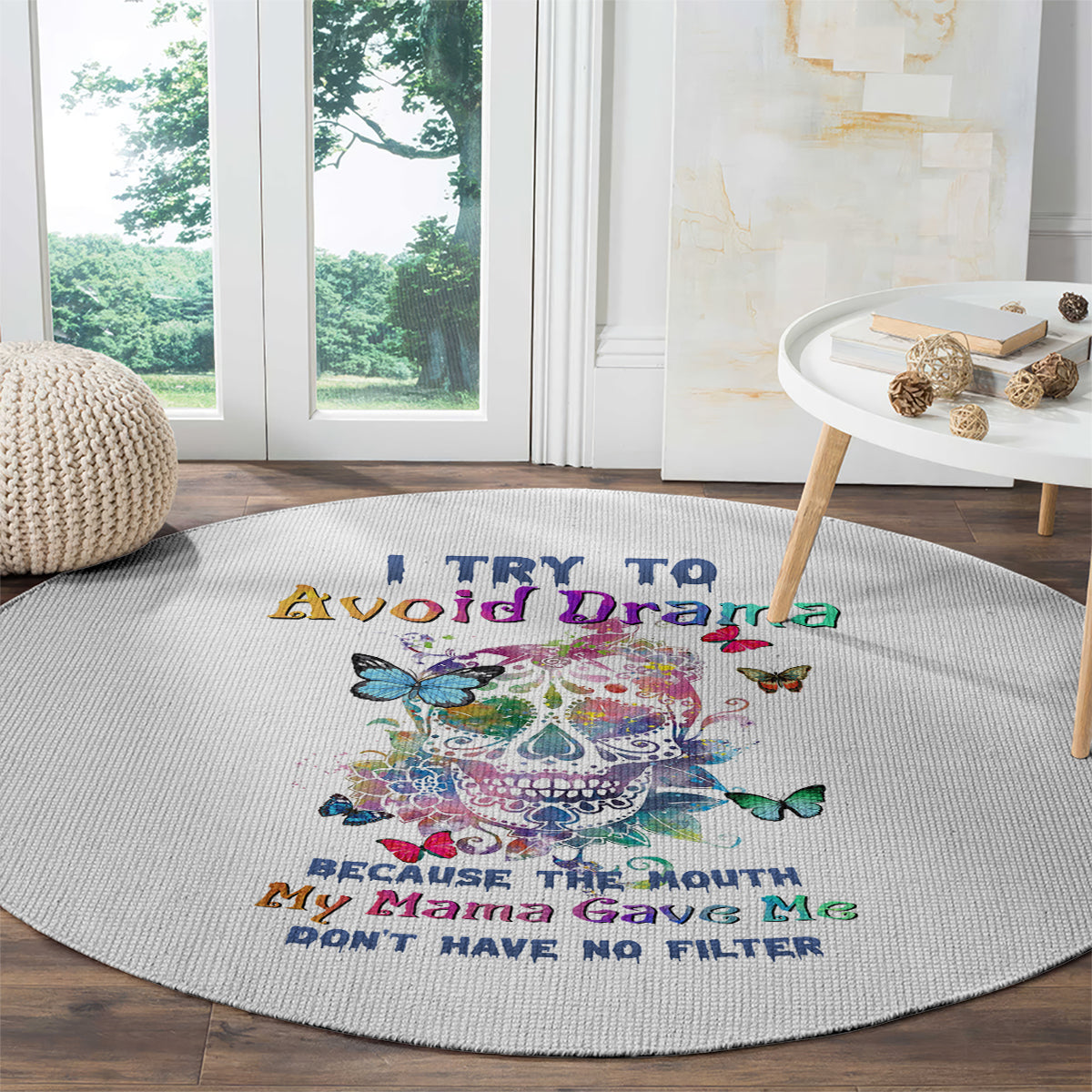Round white rug with sugar skull and butterfly graphics and multicolor quote text