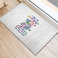 Rectangular doormat with colorful sugar skull graphic and “I try to Avoid Drama” text