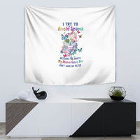 White tapestry wall hanging with colorful sugar skull, butterflies, and stacked multi-line text