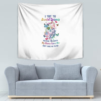 White tapestry wall hanging with colorful sugar skull illustration, butterflies, and multi-line text