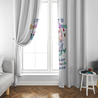 White window curtain with colorful sugar skull artwork on the side panel, tied open.