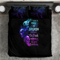 Black duvet cover and pillowcases with blue-purple skull flame and text design