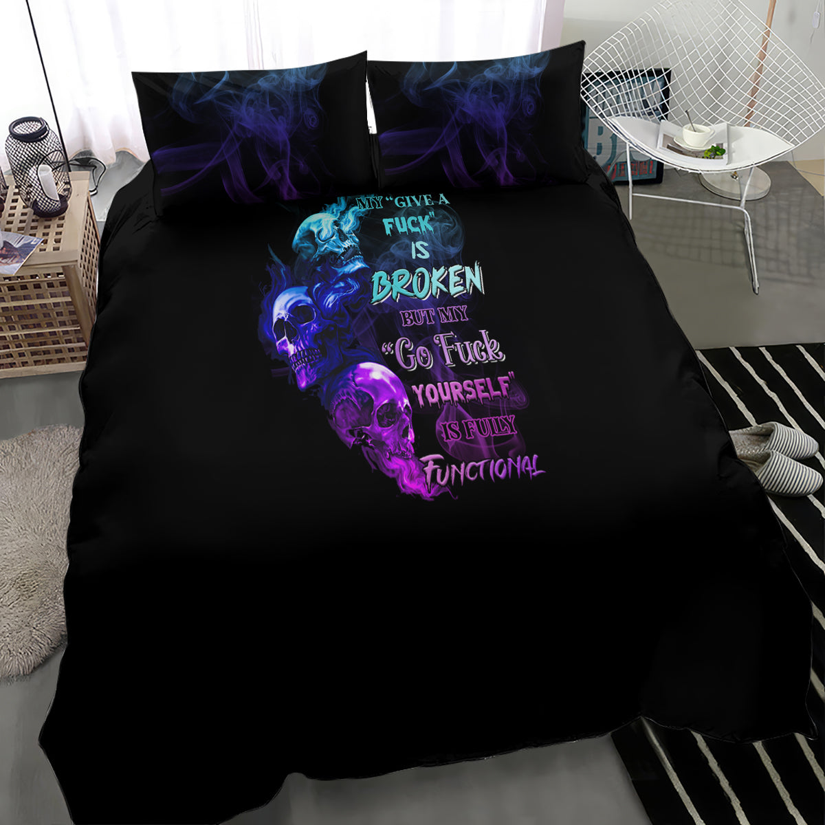 Black bedding set with central blue-purple skull and flame typography graphic