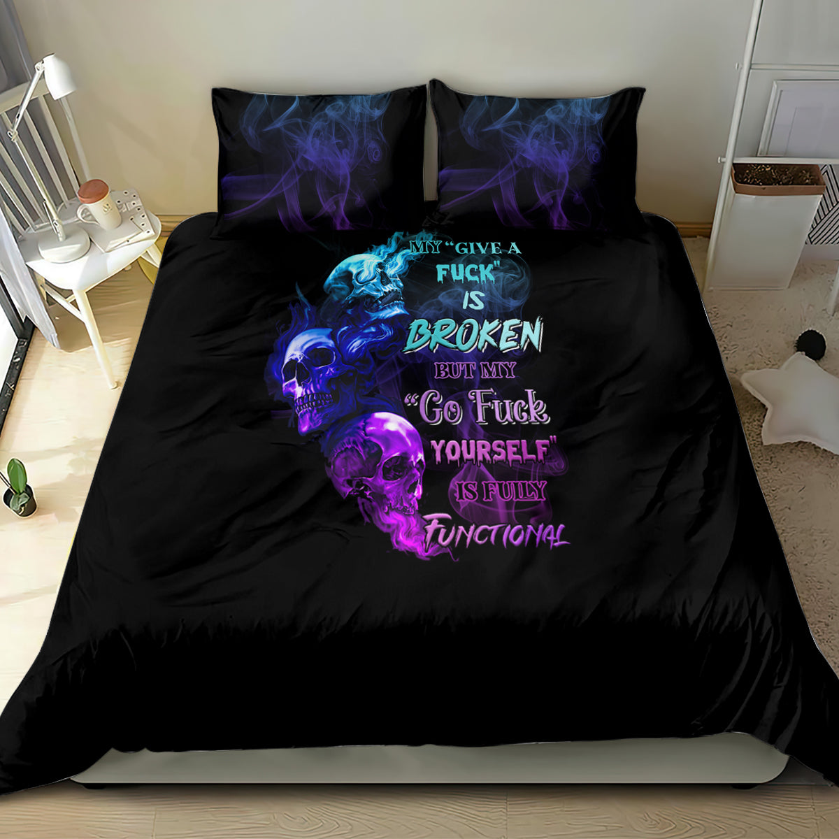Black duvet cover with bright blue and purple skull text graphic and two pillows