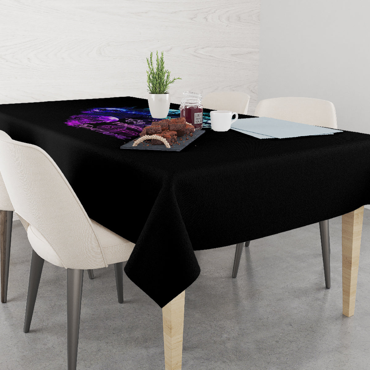 Black tablecloth with purple-blue multicolor print strip