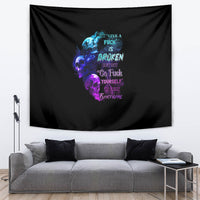 Black wall tapestry featuring multicolor skull graphic and flame word art.
