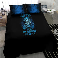 Black bed set featuring blue skull artwork, flame details, and printed text