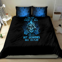 Black bedding set with centered blue skull and flames; two matching pillows