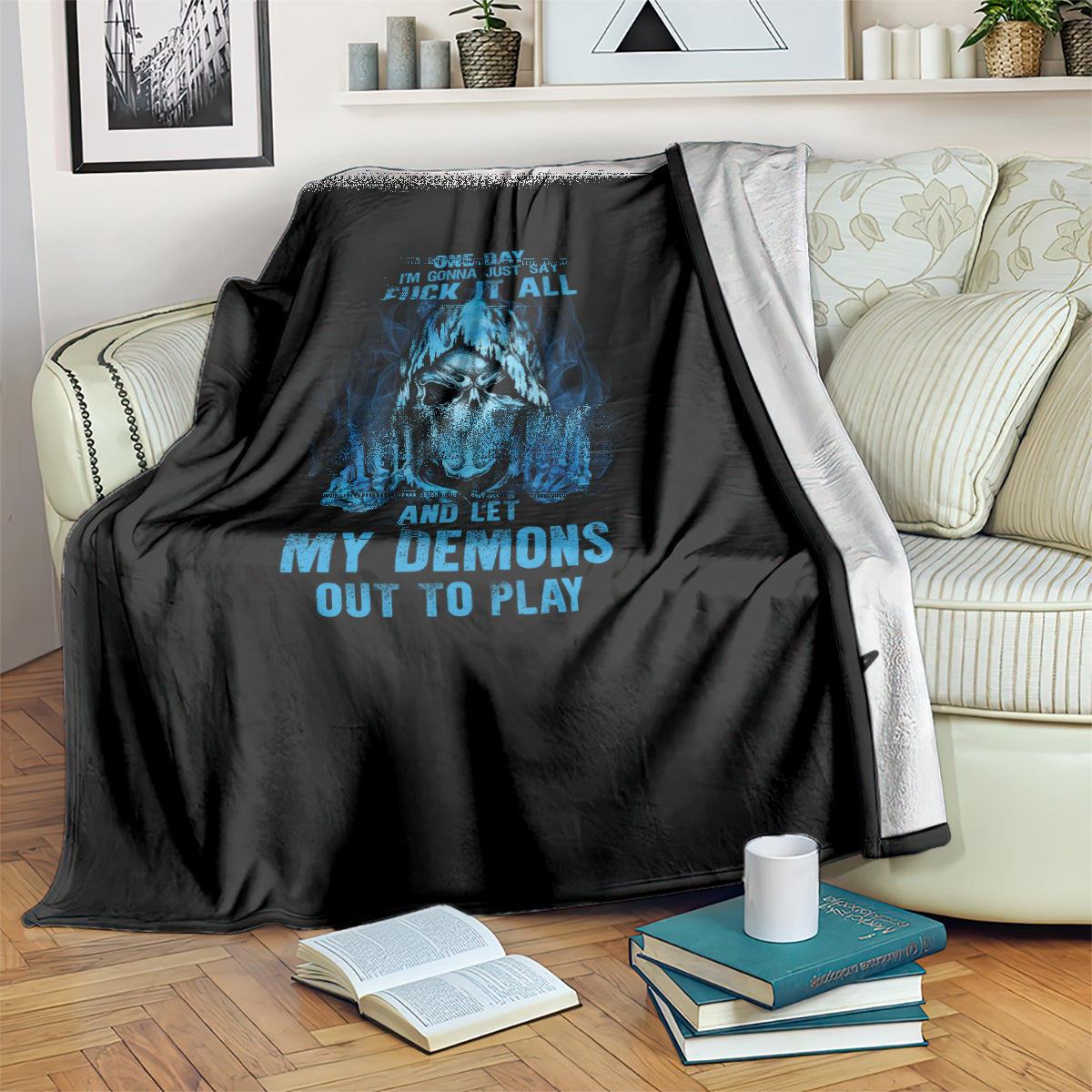 Black skull blanket with blue graphic centered and visible bold lettering