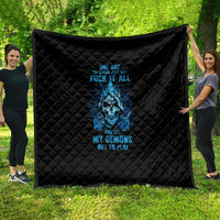Black quilt with blue skull graphic and quilted diamond stitching