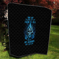 Black quilt with blue skull graphic and quilted diamond stitching, rounded corners