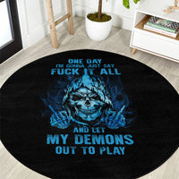 Round black carpet with blue skull graphic and multicolor text-style print