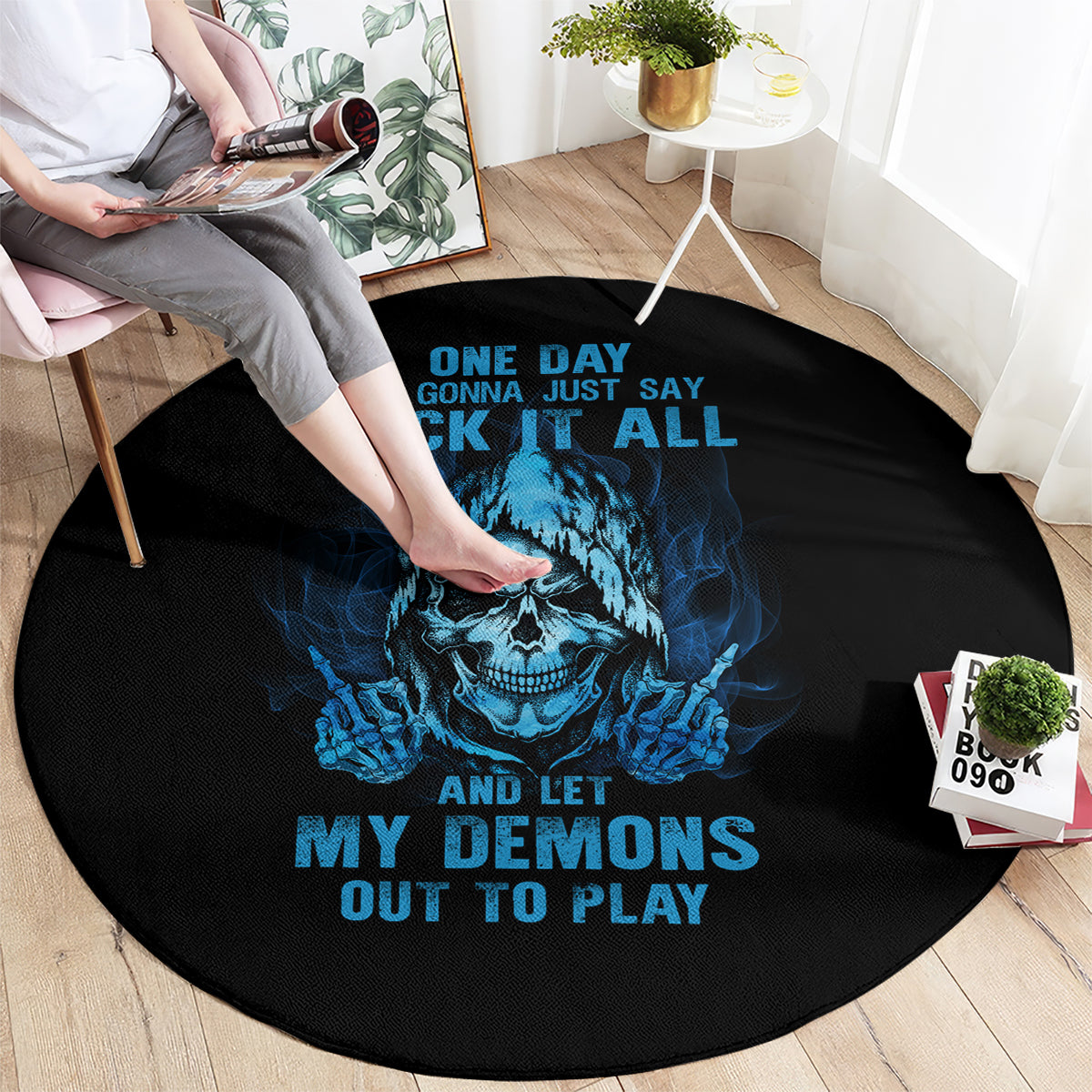 Round black carpet with blue skull graphic and scattered bone details, multicolor print