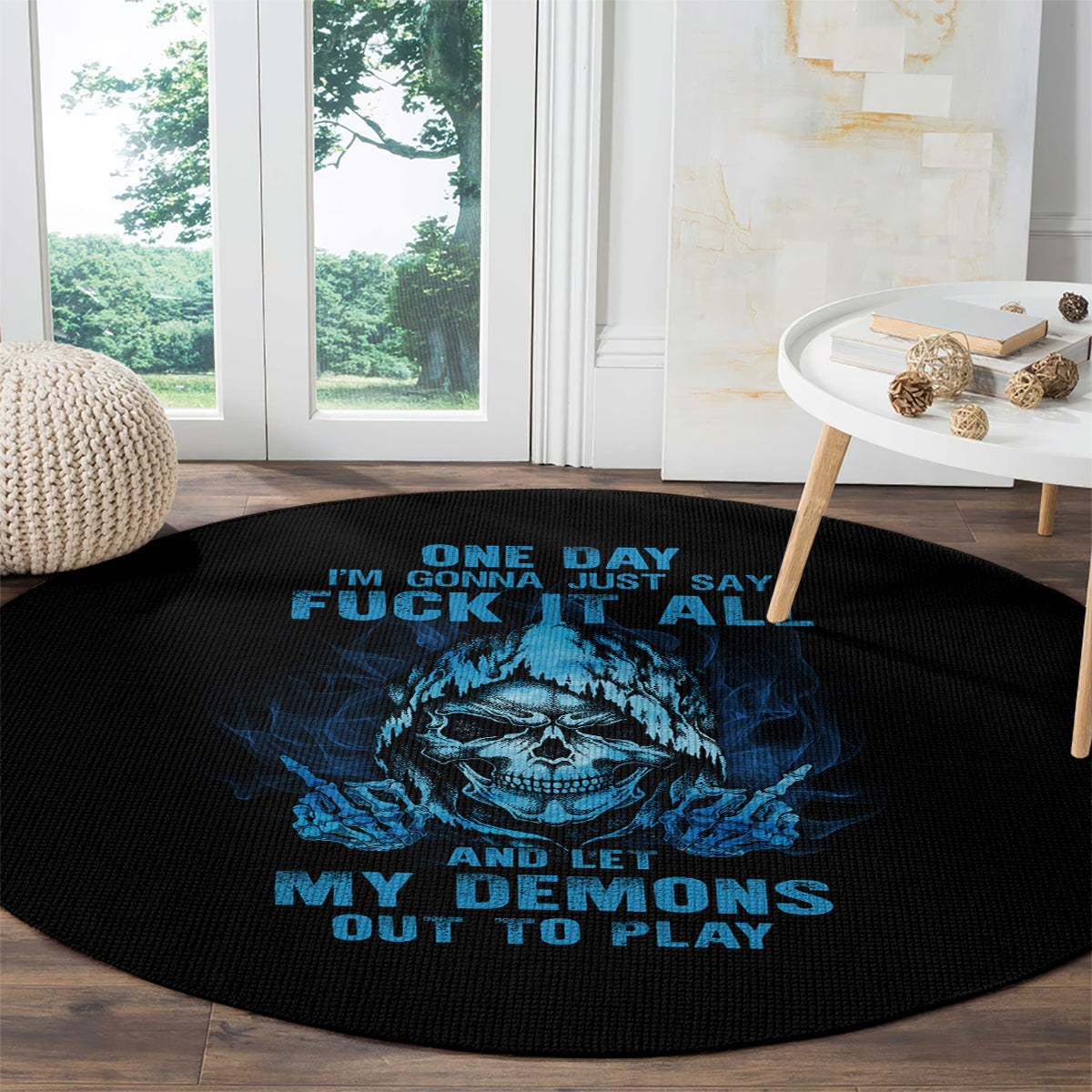 Round black carpet with large blue skull graphic and bold multicolor lettering