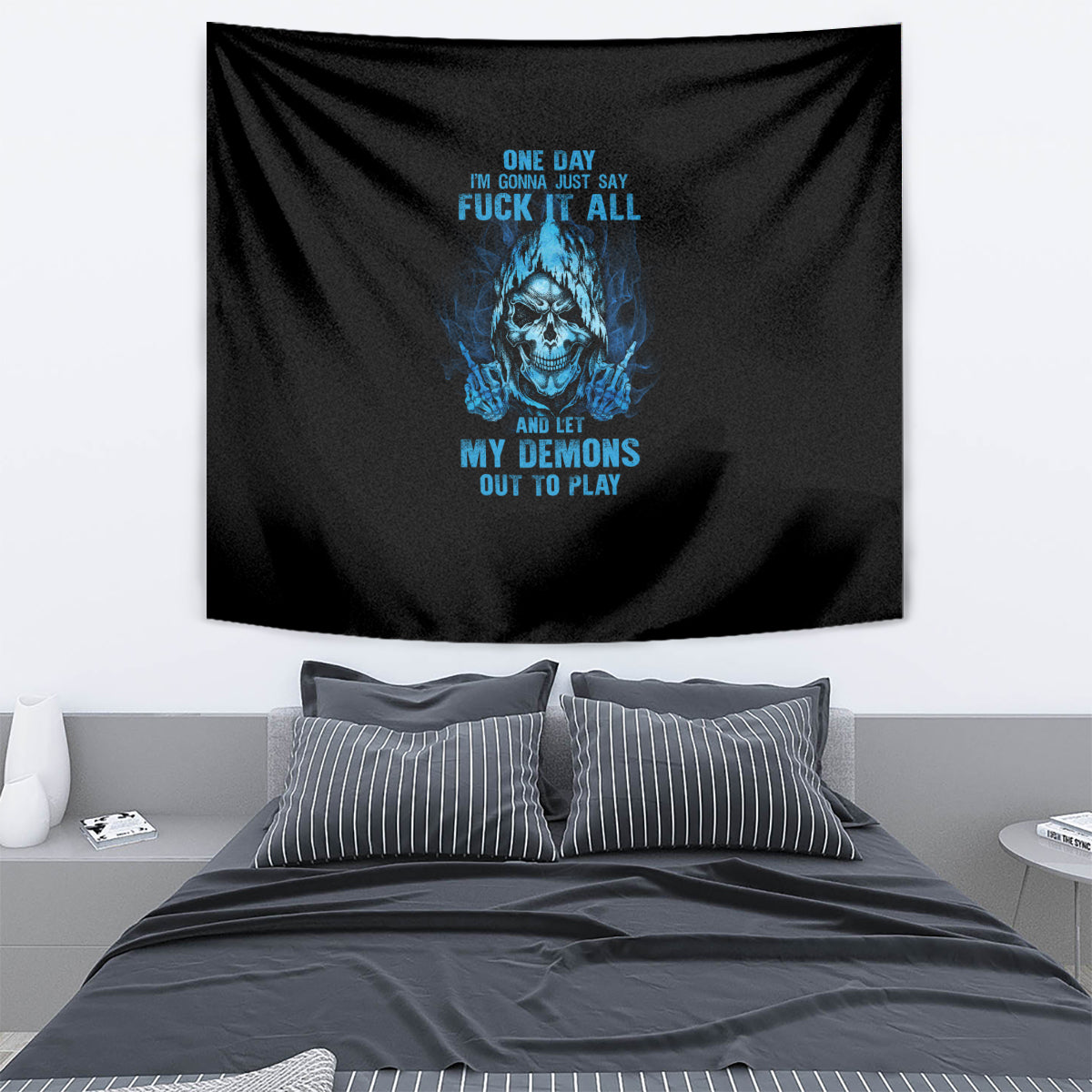 Black wall tapestry with blue skull graphic and stylized text