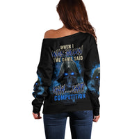 Off-shoulder black sweatshirt with blue flame skull graphic on back