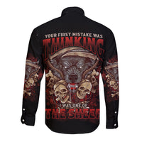 Black long-sleeve button shirt with large back skull graphic and bold red lettering