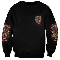 Black sweatshirt with small chest emblem and skull graphics on both sleeves